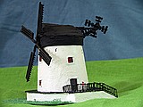 Side View
Side view of windmill showing illumination and sails stationary